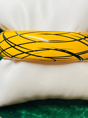 Yellow Bangle with Black Crosshatch Devil's Details